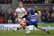 27 January 2023; Rob Lyttle of Ulster kicks past Cornel Smit of DHL Stormers during the United Rugby Championship match between Ulster and DHL Stormers at Kingspan Stadium in Belfast. Photo by Ramsey Cardy/Sportsfile