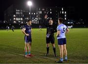1 February 2023; Referee Conor Dourneen performs the coin toss with team captains Darragh Campion of TU Dublin and Kieran Kennedy of UCD before the HE GAA Sigerson Cup Quarter-Final match between TU Dublin and University College Dublin at TU Dublin Grangegorman in Dublin. Photo by Piaras Ó Mídheach/Sportsfile
