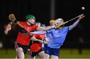 2 February 2023; Dónal O’Shea of UCD in action against Cormac O’Brien of UCC during the HE GAA Fitzgibbon Cup Group C match between University College Dublin and University College Cork at Billings Park in Belfield, Dublin. Photo by Seb Daly/Sportsfile