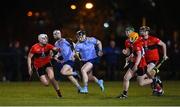 2 February 2023; Cian O’Sullivan of UCD in action against Eoin Roche, left, and Darragh Flynn of UCC during the HE GAA Fitzgibbon Cup Group C match between University College Dublin and University College Cork at Billings Park in Belfield, Dublin. Photo by Seb Daly/Sportsfile