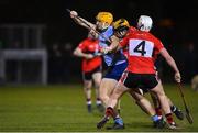 2 February 2023; Cillian Egan of UCD in action against Eoin Roche, 4, and Daniel Hogan of UCC during the HE GAA Fitzgibbon Cup Group C match between University College Dublin and University College Cork at Billings Park in Belfield, Dublin. Photo by Seb Daly/Sportsfile