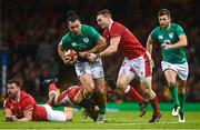 4 February 2023; James Lowe of Ireland is tackled by Taulupe Faletau and George North, right, of Wales during the Guinness Six Nations Rugby Championship match between Wales and Ireland at Principality Stadium in Cardiff, Wales. Photo by David Fitzgerald/Sportsfile