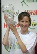 7 June 2004; Catherina McKiernan with her trophy after winning the 2004 Flora Women's Mini-Marathon. Dublin. Picture credit; Brendan Moran / SPORTSFILE