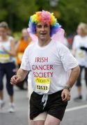 7 June 2004; One of the many fun runners competing in the 2004 Flora Women's Mini-Marathon. Dublin. Picture credit; Brendan Moran / SPORTSFILE