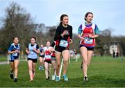 8 February 2023; Aoibhinn O Brien of Holy Faith Secondary School, right, and Rebecca Larkin of Scoil Mhuire competing in the Junior girls race during the 123.ie Leinster Schools Cross Country 2023 at Santry Demesne in Dublin. Photo by David Fitzgerald/Sportsfile