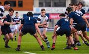 10 February 2023; Charlie Callaghan of Belvedere College in action against Evan Caddow, left, and Charlie Simmons of Wesley College during the Bank of Ireland Leinster Rugby Schools Junior Cup First Round match between Wesley College and Belvedere College at Energia Park in Dublin. Photo by Tyler Miller/Sportsfile