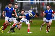 10 February 2023; Farrell Delourmel of France is tackled by Aran Egan of IURU during the Maxol Irish Universities Rugby Union Student International match between Ireland and France at the Mardyke in Cork. Photo by Eóin Noonan/Sportsfile