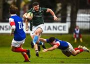 10 February 2023; Cathal Duff of IURU avoids the tackle of Tom Danovaro of France during the Maxol Irish Universities Rugby Union Student International match between Ireland and France at the Mardyke in Cork. Photo by Eóin Noonan/Sportsfile