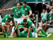 11 February 2023; Hugo Keenan of Ireland, centre, celebrates with teammates Jonathan Sexton and Conor Murray after scoring his side's first try during the Guinness Six Nations Rugby Championship match between Ireland and France at the Aviva Stadium in Dublin. Photo by Harry Murphy/Sportsfile