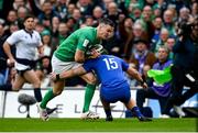 11 February 2023; Jonathan Sexton of Ireland is tackled by Thomas Ramos of France during the Guinness Six Nations Rugby Championship match between Ireland and France at the Aviva Stadium in Dublin. Photo by Harry Murphy/Sportsfile