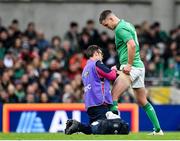 11 February 2023; Jonathan Sexton of Ireland receives medical attention from physiotherapist Stephen Mutch during the Guinness Six Nations Rugby Championship match between Ireland and France at the Aviva Stadium in Dublin. Photo by Seb Daly/Sportsfile