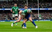 11 February 2023; Mack Hansen of Ireland is tackled close to the line by Antoine Dupont of France during the Guinness Six Nations Rugby Championship match between Ireland and France at the Aviva Stadium in Dublin. Photo by Harry Murphy/Sportsfile