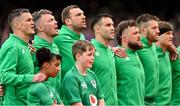 11 February 2023; Ireland captain Jonathan Sexton and his teammates stand for the national anthems before the Guinness Six Nations Rugby Championship match between Ireland and France at the Aviva Stadium in Dublin. Photo by Brendan Moran/Sportsfile