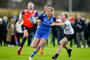 12 February 2023; Abby Healy of Leinster holds off the tackle of Elle Corkey of Ulster during the U18 Girls Interprovincial match between Leinster and Ulster at the IRFU High Performance Centre on the Sport Ireland Campus in Dublin. Photo by Brendan Moran/Sportsfile