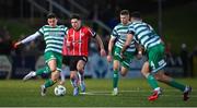10 February 2023; Adam O'Reilly of Derry City is tackled by Simon Power of Shamrock Rovers during the FAI President's Cup match between Derry City and Shamrock Rovers at the Ryan McBride Brandywell Stadium in Derry. Photo by Stephen McCarthy/Sportsfile