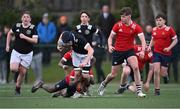 15 February 2023; Evan Hayes of Metro in action against Sam Manuel of North East during the Leinster Rugby Shane Horgan Round Four match between Metro and North East at Skerries RFC in Skerries, Dublin. Photo by Piaras Ó Mídheach/Sportsfile