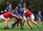 16 February 2023; Alma Obehi Atagamen of Leinster makes a break on her way to scoring her side's first try during the U18 Girls Interprovincial match between Leinster and Munster at Terenure College in Dublin. Photo by Harry Murphy/Sportsfile