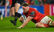 17 February 2023; Gavin Coombes of Munster dives over to score his side's first try during the United Rugby Championship match between Munster and Ospreys at Thomond Park in Limerick. Photo by Harry Murphy/Sportsfile