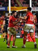 17 February 2023; Paddy Patterson of Munster, left, celebrates with Malakai Fekitoa after scoring his side's fifth try during the United Rugby Championship match between Munster and Ospreys at Thomond Park in Limerick. Photo by Sam Barnes/Sportsfile