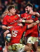 17 February 2023; Shane Daly of Munster, 15, is congratulated by team-mates after scoring his side's eighth try during the United Rugby Championship match between Munster and Ospreys at Thomond Park in Limerick. Photo by Sam Barnes/Sportsfile