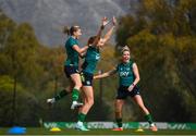 18 February 2023; Players, from left, Abbie Larkin, Hayley Nolan and Denise O'Sullivan celebrate during a Republic of Ireland women training session at Dama de Noche Football Center in Marbella, Spain. Photo by Stephen McCarthy/Sportsfile