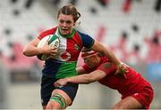 18 February 2023; Brittany Hogan of Combined Provinces XV is tackled by Niamh Terry of Wales Development XV during the Celtic Challenge 2023 match between Combined Provinces XV and Welsh Development XV at Kingspan Stadium in Belfast. Photo by Ramsey Cardy/Sportsfile