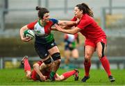 18 February 2023; Deirbhile Nic a Bhaird of Combined Provinces XV is tackled by Caitlin Lewis, left, and Robyn Wilkins of Wales Development XV during the Celtic Challenge 2023 match between Combined Provinces XV and Welsh Development XV at Kingspan Stadium in Belfast. Photo by Ramsey Cardy/Sportsfile