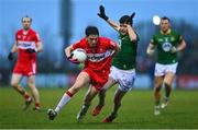 18 February 2023; Paul Cassidy of Derry in action against Jack O'Connor of Meath during the Allianz Football League Division Two match between Derry and Meath at Derry GAA Centre of Excellence in Owenbeg, Derry. Photo by Ben McShane/Sportsfile