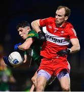 18 February 2023; Jason Scully of Meath in action against Padraig Cassidy of Derry during the Allianz Football League Division Two match between Derry and Meath at Derry GAA Centre of Excellence in Owenbeg, Derry. Photo by Ben McShane/Sportsfile