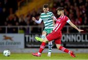 18 February 2023; Dylan Watts of Shamrock Rovers in action against Greg Bolger of Sligo Rovers during the SSE Airtricity Men's Premier Division match between Sligo Rovers and Shamrock Rovers at The Showgrounds in Sligo. Photo by Seb Daly/Sportsfile