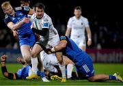18 February 2023; Rhodri Williams of Dragons is tackled by John McKee, left, and Jamie Osborne of Leinster during the United Rugby Championship match between Leinster and Dragons at RDS Arena in Dublin. Photo by Tyler Miller/Sportsfile