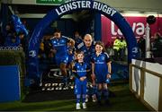 18 February 2023; Leinster captain Rhys Ruddock with matchday mascots Riley Byrne, aged five, left, and Niamh Kane, aged nine, before the United Rugby Championship match between Leinster and Dragons at RDS Arena in Dublin. Photo by Harry Murphy/Sportsfile