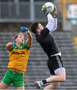 19 February 2023; Monaghan goalkeeper Rory Beggan in action against Stephen McMenamin of Donegal during the Allianz Football League Division One match between Monaghan and Donegal at St Tiernach's Park in Clones, Monaghan. Photo by Ramsey Cardy/Sportsfile