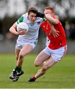 19 February 2023; Hugh Bourke of Limerick in action against Donal McKenny of Louth during the Allianz Football League Division Two match between Louth and Limerick at Páirc Mhuire in Ardee, Louth. Photo by Ben McShane/Sportsfile