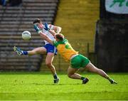 19 February 2023; Gary Mohan of Monaghan in action against Stephen McMenamin of Donegal during the Allianz Football League Division One match between Monaghan and Donegal at St Tiernach's Park in Clones, Monaghan. Photo by Philip Fitzpatrick/Sportsfile