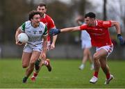 19 February 2023; Cian Sheehan of Limerick in action against Craig Lennon of Louth during the Allianz Football League Division Two match between Louth and Limerick at Páirc Mhuire in Ardee, Louth. Photo by Ben McShane/Sportsfile