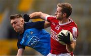 19 February 2023; Ruairí Deane of Cork is tackled by Tom Lahiff of Dublin during the Allianz Football League Division Two match between Cork and Dublin at Páirc Ui Chaoimh in Cork. Photo by Eóin Noonan/Sportsfile