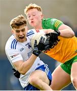 19 February 2023; Karl Gallagher of Monaghan in action against Oisin Gallen of Donegal during the Allianz Football League Division One match between Monaghan and Donegal at St Tiernach's Park in Clones, Monaghan. Photo by Ramsey Cardy/Sportsfile