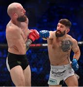 25 February 2023; Bryce Logan, right, in action against Peter Queally during their lightweight bout at Bellator 291 in the 3 Arena, Dublin. Photo by David Fitzgerald/Sportsfile