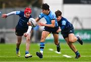 28 February 2023; Sean King of St Michael's College is tackled by Jaydon Carroll, left, and Finn Watt of Castleknock College during the Bank of Ireland Leinster Schools Junior Cup Quarter Final match between Castleknock College and St Michael’s College at Energia Park in Dublin. Photo by Ben McShane/Sportsfile