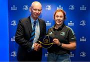 1 March 2023; Niamh O’Dowd is presented with her first cap by incoming Leinster Rugby president Billy Murphy during the Leinster Rugby Women's Cap and Jersey presentation at the Bank of Ireland Montrose Branch in Dublin. Photo by Harry Murphy/Sportsfile