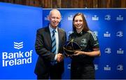 1 March 2023; Clare Gorman is presented with her first cap by incoming Leinster Rugby president Billy Murphy during the Leinster Rugby Women's Cap and Jersey presentation at the Bank of Ireland Montrose Branch in Dublin. Photo by Harry Murphy/Sportsfile
