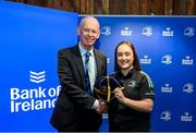 1 March 2023; Lisa Mullen is presented with her first cap by incoming Leinster Rugby president Billy Murphy during the Leinster Rugby Women's Cap and Jersey presentation at the Bank of Ireland Montrose Branch in Dublin. Photo by Harry Murphy/Sportsfile