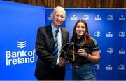 1 March 2023; Katie Whelan is presented with her first cap by incoming Leinster Rugby president Billy Murphy during the Leinster Rugby Women's Cap and Jersey presentation at the Bank of Ireland Montrose Branch in Dublin. Photo by Harry Murphy/Sportsfile