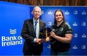 1 March 2023; Megan Collis is presented with her first cap by incoming Leinster Rugby president Billy Murphy during the Leinster Rugby Women's Cap and Jersey presentation at the Bank of Ireland Montrose Branch in Dublin. Photo by Harry Murphy/Sportsfile