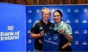 1 March 2023; Dannah O'Brien is presented with her jersey by head coach Tania Rosser during the Leinster Rugby Women's Cap and Jersey presentation at the Bank of Ireland Montrose Branch in Dublin. Photo by Harry Murphy/Sportsfile