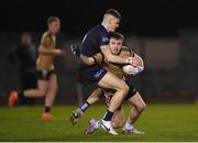 2 March 2023; Mattie Long of TUS Midlands is tackled by Kevin Swayne of SETU Carlow during the Electric Ireland Higher Education GAA Freshers Football 2 Final match between South East Technological University Carlow and Technological University of the Shannon: Midlands at South East Technological University Sports Complex in Carlow. Photo by Stephen McCarthy/Sportsfile