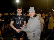 2 March 2023; Gerry Tully presents the player of the match award to Kevin Swayne of SETU Carlow after the Electric Ireland Higher Education GAA Freshers Football 2 Final match between South East Technological University Carlow and Technological University of the Shannon: Midlands at South East Technological University Sports Complex in Carlow. Photo by Stephen McCarthy/Sportsfile