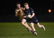 2 March 2023; Eoghan Byrne of SETU Carlow in action against Adam Kelly of TUS Midlands during the Electric Ireland Higher Education GAA Freshers Football 2 Final match between South East Technological University Carlow and Technological University of the Shannon: Midlands at South East Technological University Sports Complex in Carlow. Photo by Stephen McCarthy/Sportsfile