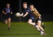 2 March 2023; Eoghan Byrne of SETU Carlow in action against Adam Kelly of TUS Midlands during the Electric Ireland Higher Education GAA Freshers Football 2 Final match between South East Technological University Carlow and Technological University of the Shannon: Midlands at South East Technological University Sports Complex in Carlow. Photo by Stephen McCarthy/Sportsfile